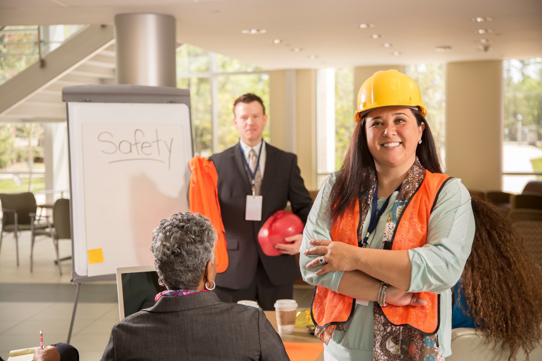 Safety in the workplace. Presentation with workers.