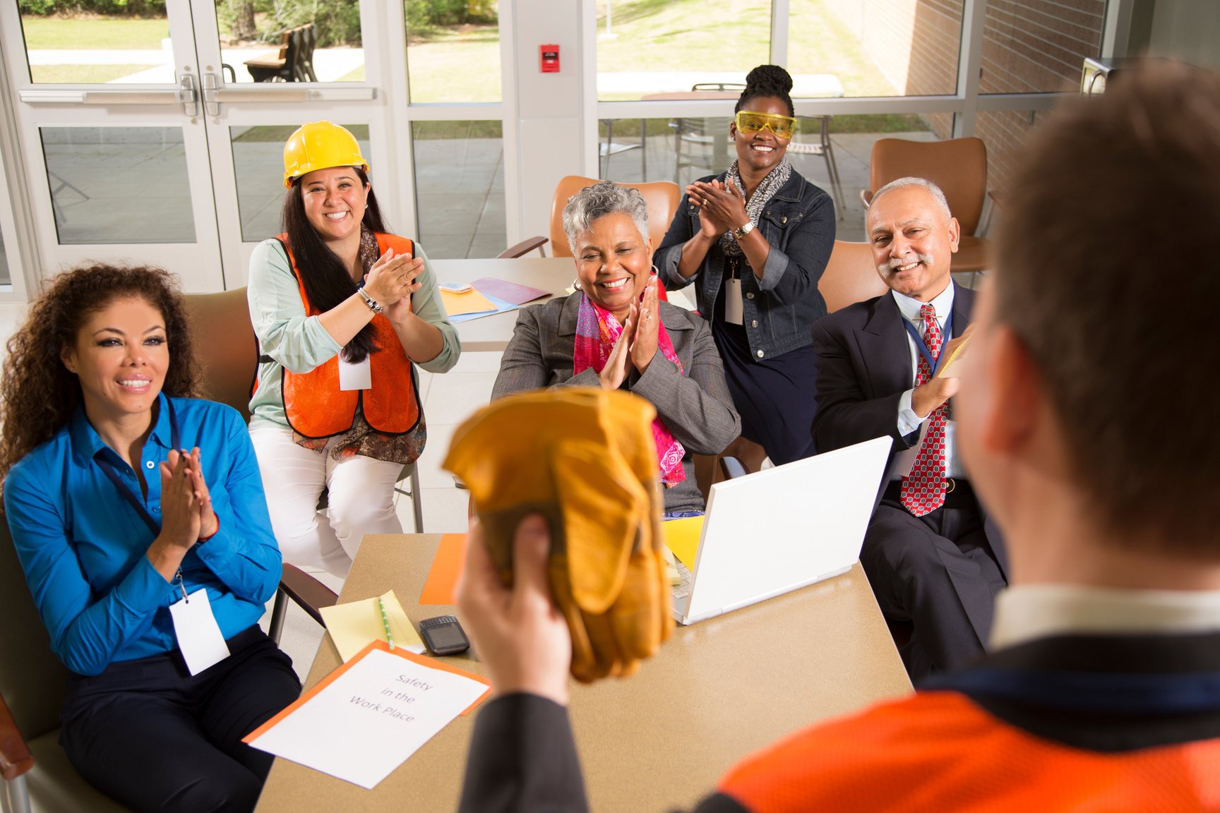 Safety in the workplace. Presentation with office workers.